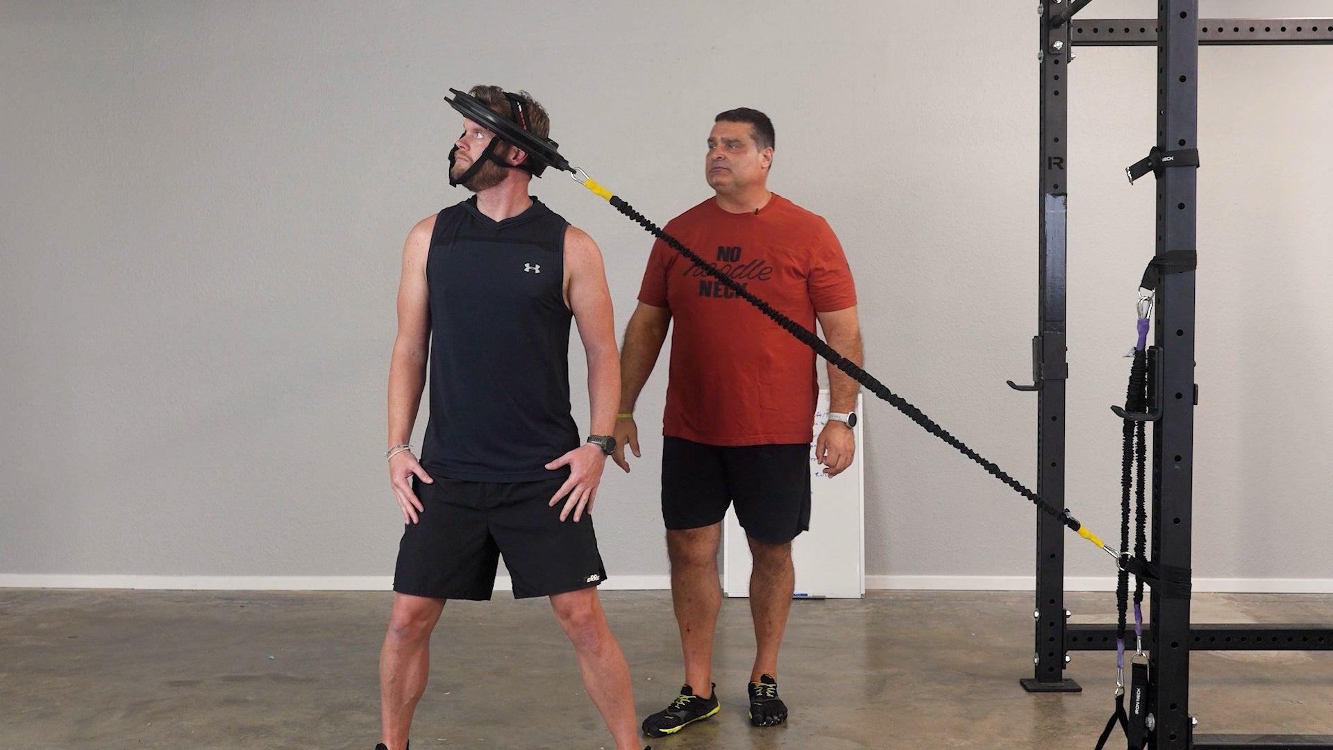 Strength coach Joe Kenn trains college football athlete