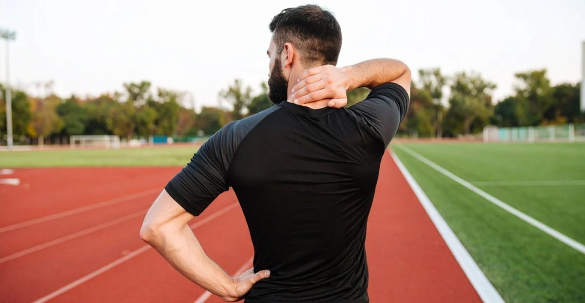 Black raglan athletic shirt for sports neck recovery