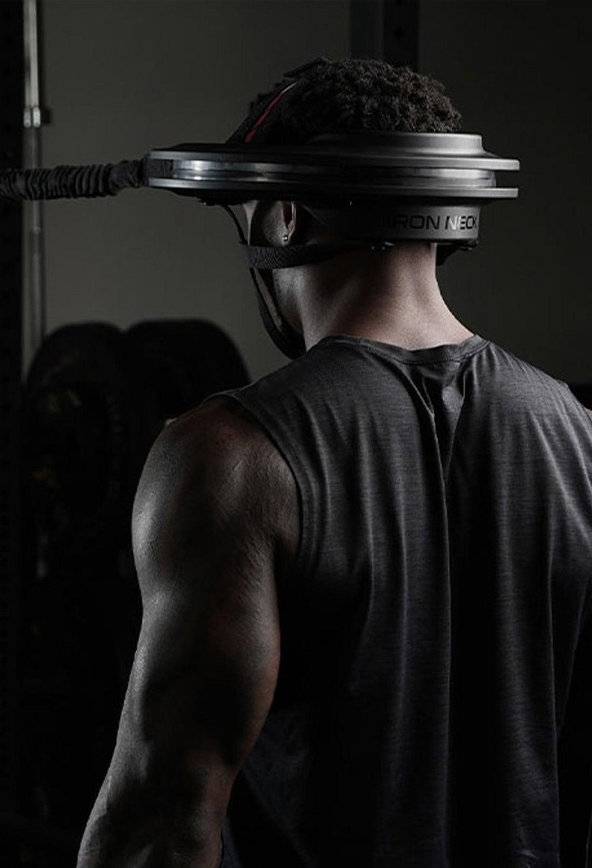 Person using Iron Neck in the gym