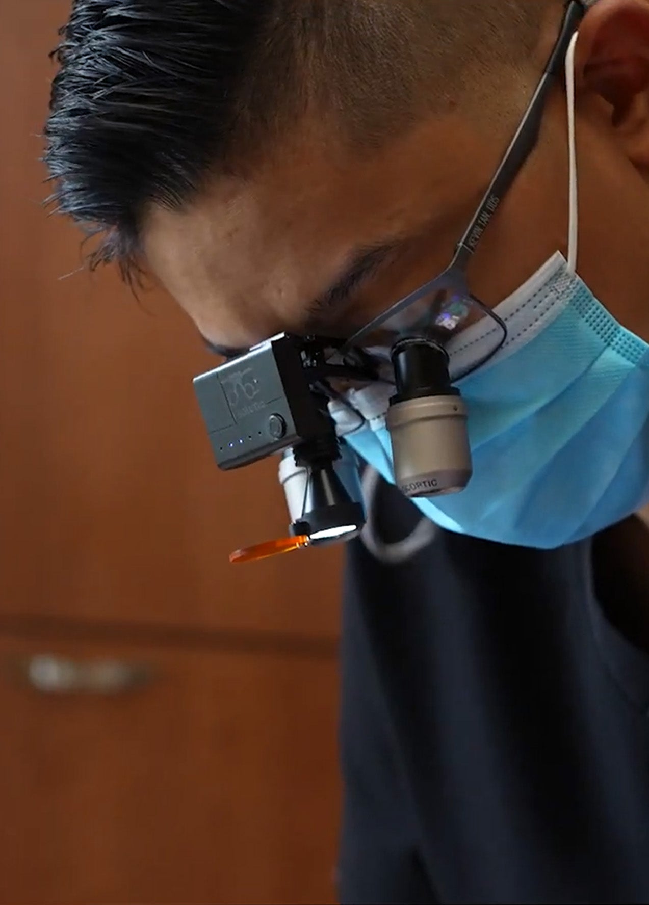 Kevin Tan suffering from neck pain and improving it with Iron Neck